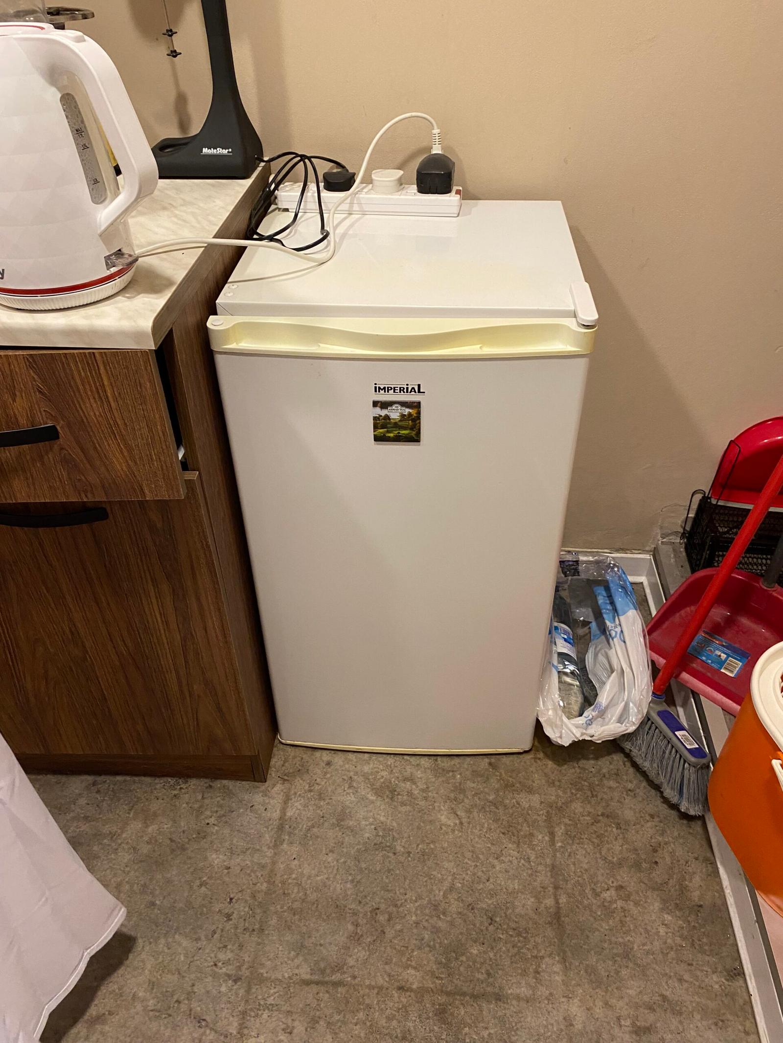 Fridge with freezer compartment