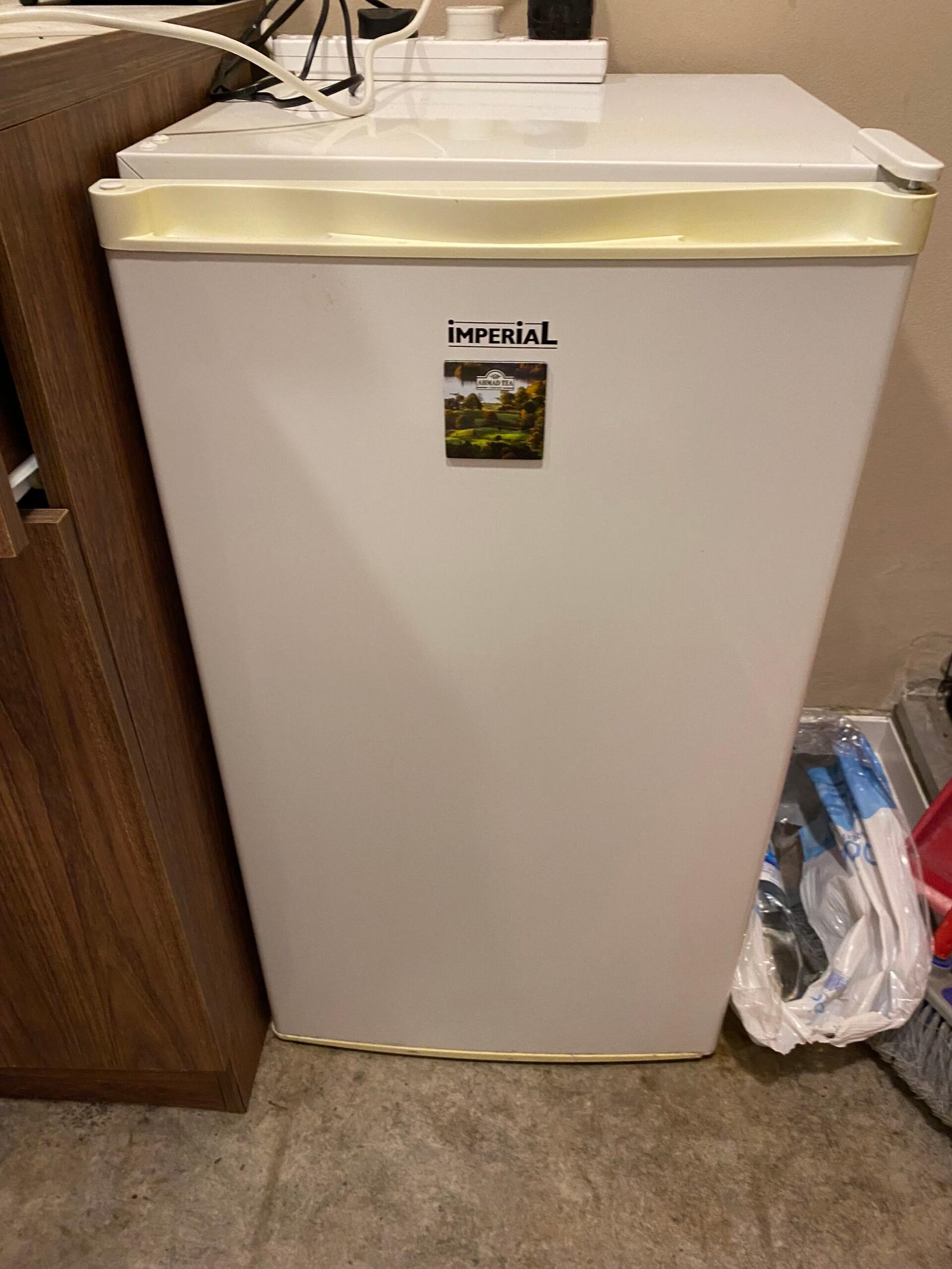 Fridge with freezer compartment