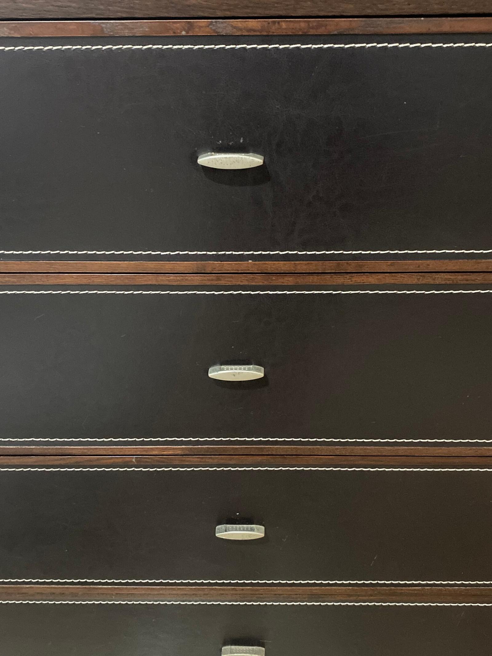 Wood and leather bound chest of drawers for sale in excellent condition.