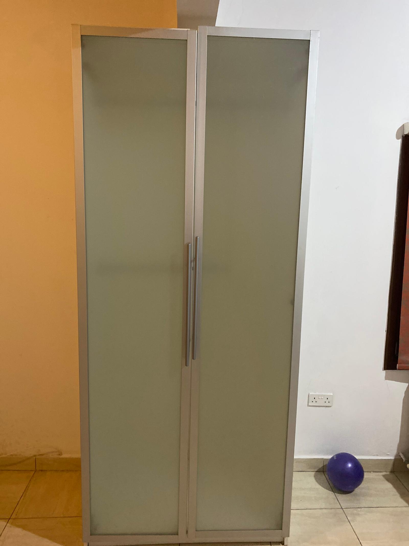 Double door glassed wardrobe