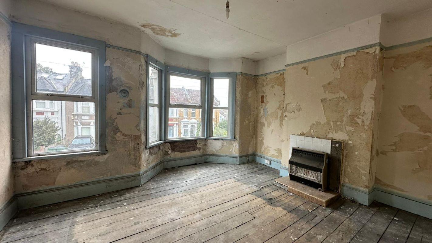 Three Bedroom Mid Terrace House.